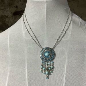 Elegant Silver and Blue Pendant Necklace